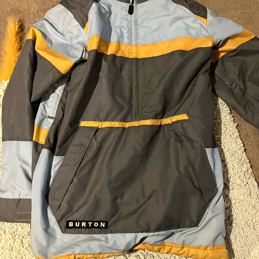 Burton snowboard anorak. Included: snow skirt, pockets, &1inch tear (pictured).
